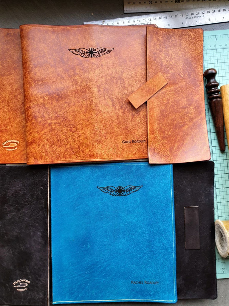 Sparrowhawk Leather work in progress laser engraved hand dyed pilot logbook covers