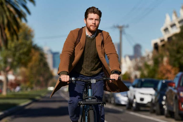 Sam Wines biking in Melbourne on Concrete Blue Amsterdam bicycle