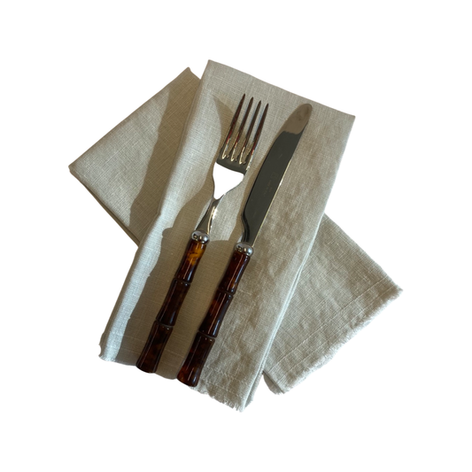 White linen napkins made in the USA with pink stitching. – celina mancurti