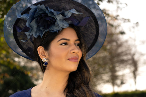 Summer wedding outfit with blue hat