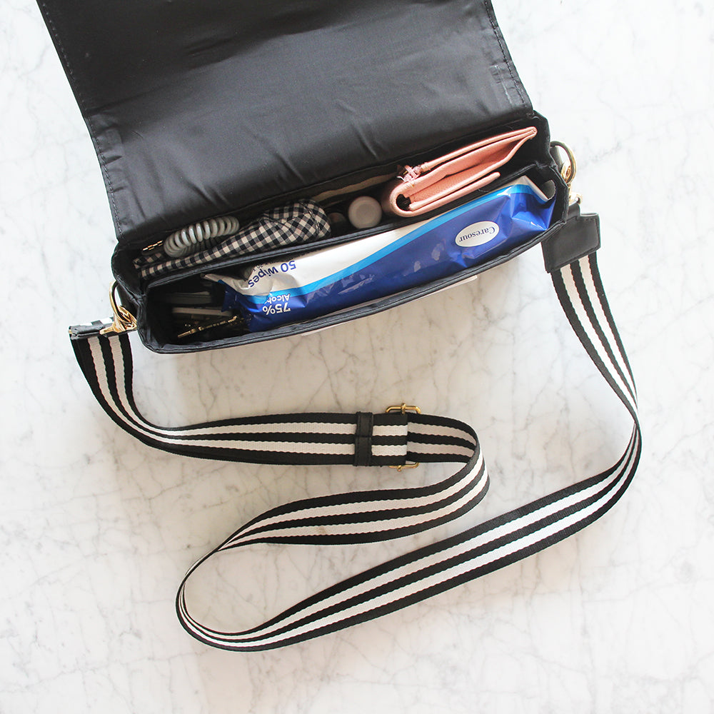 crossbody bag with wipes access