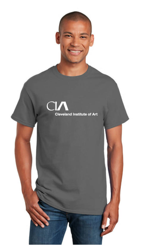 young man wearing a gray tshirt with the CIA logo printed on it