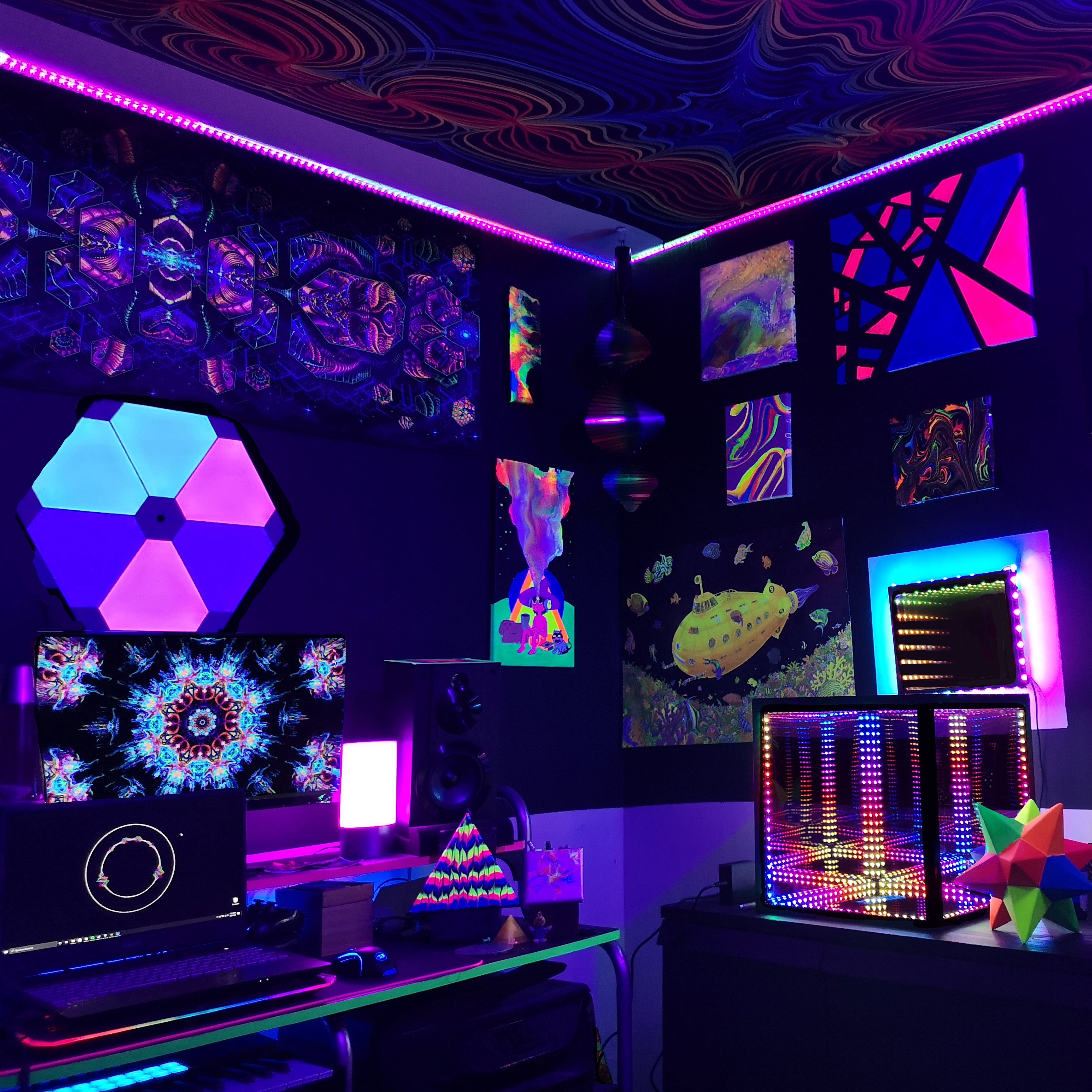 Corner  of a bedroom with a HyperCube and bright stickers that are part of her bedroom mood lighting ideas