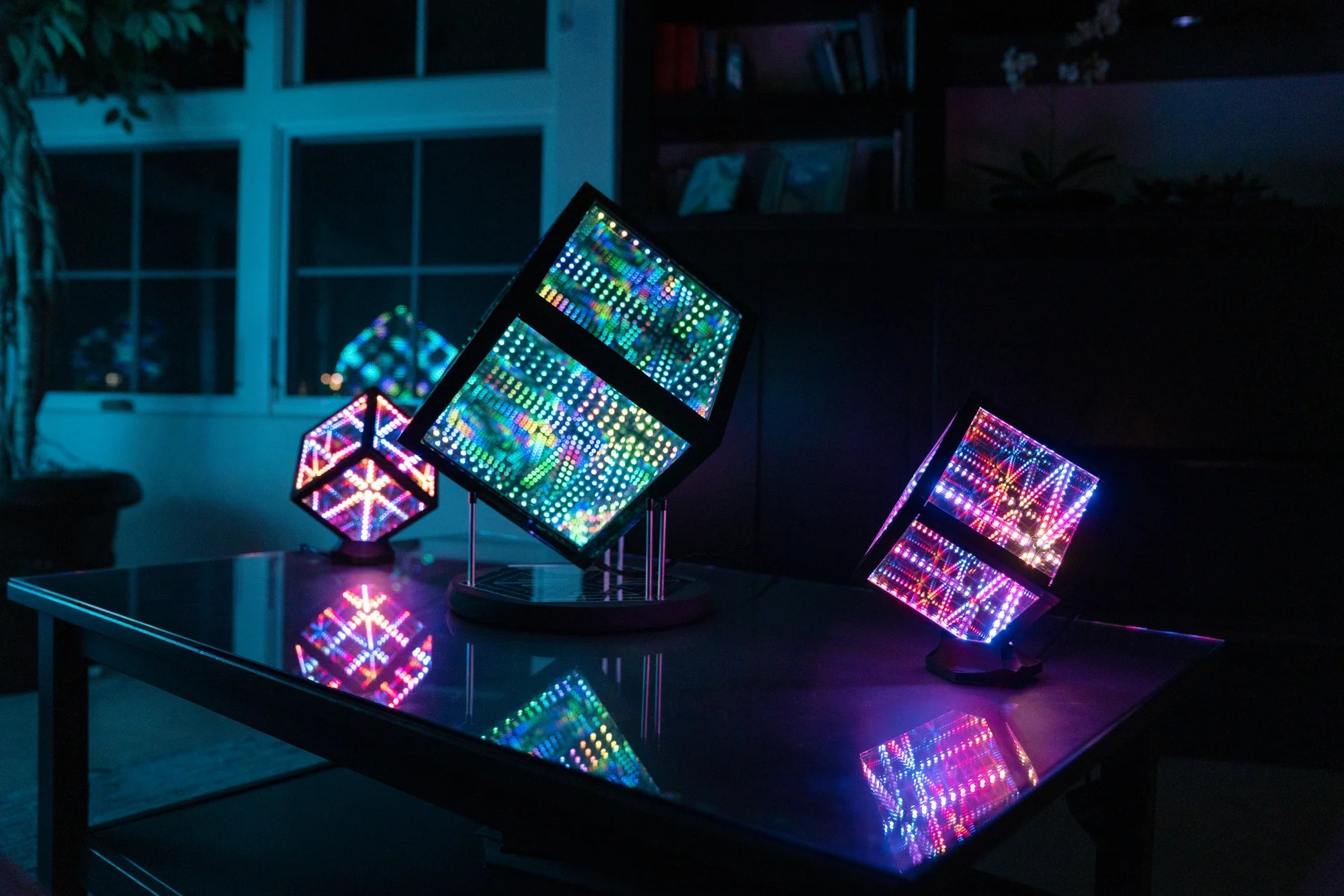 Three Hypercubes on a table in a room made man cave by a man inspired after reading about what is a man cave