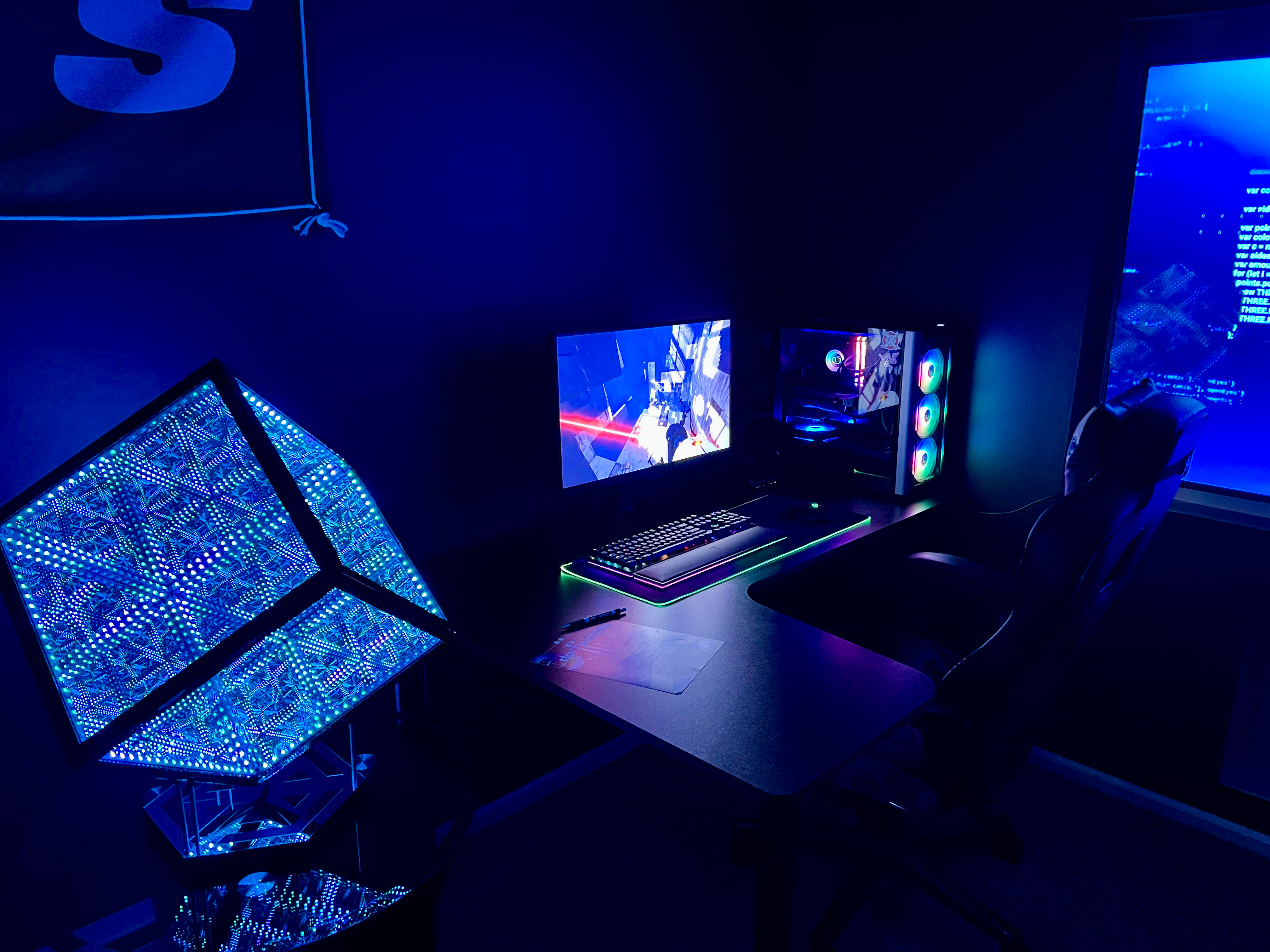 gaming room with blue lighting setup