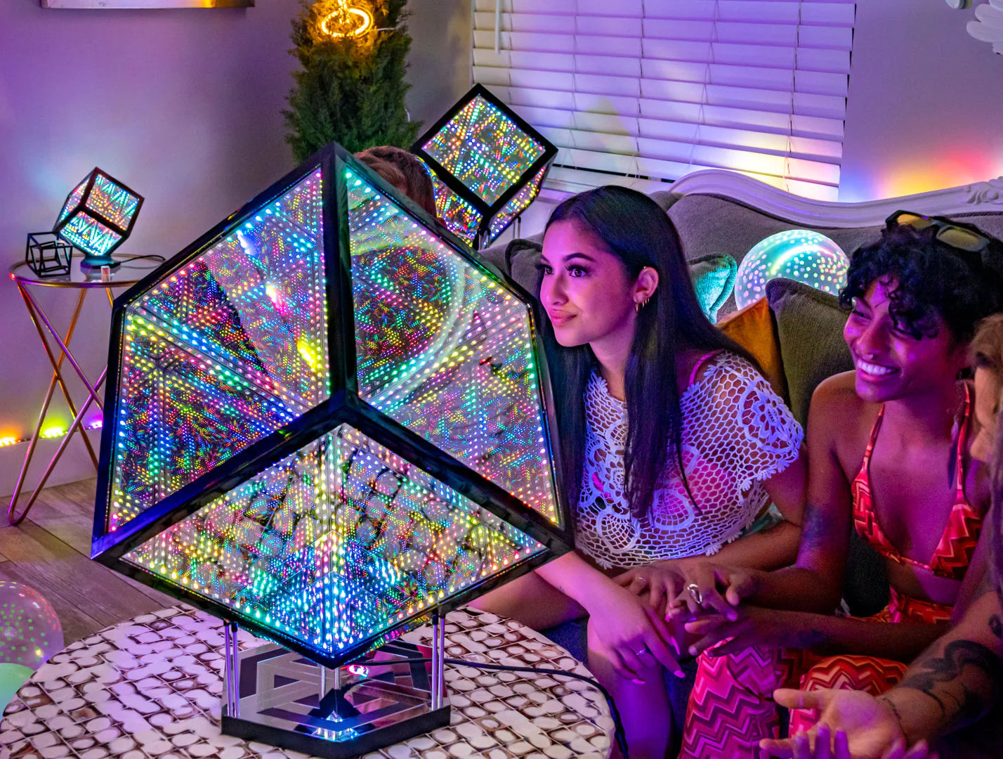 people mesmerized by infinity mirror