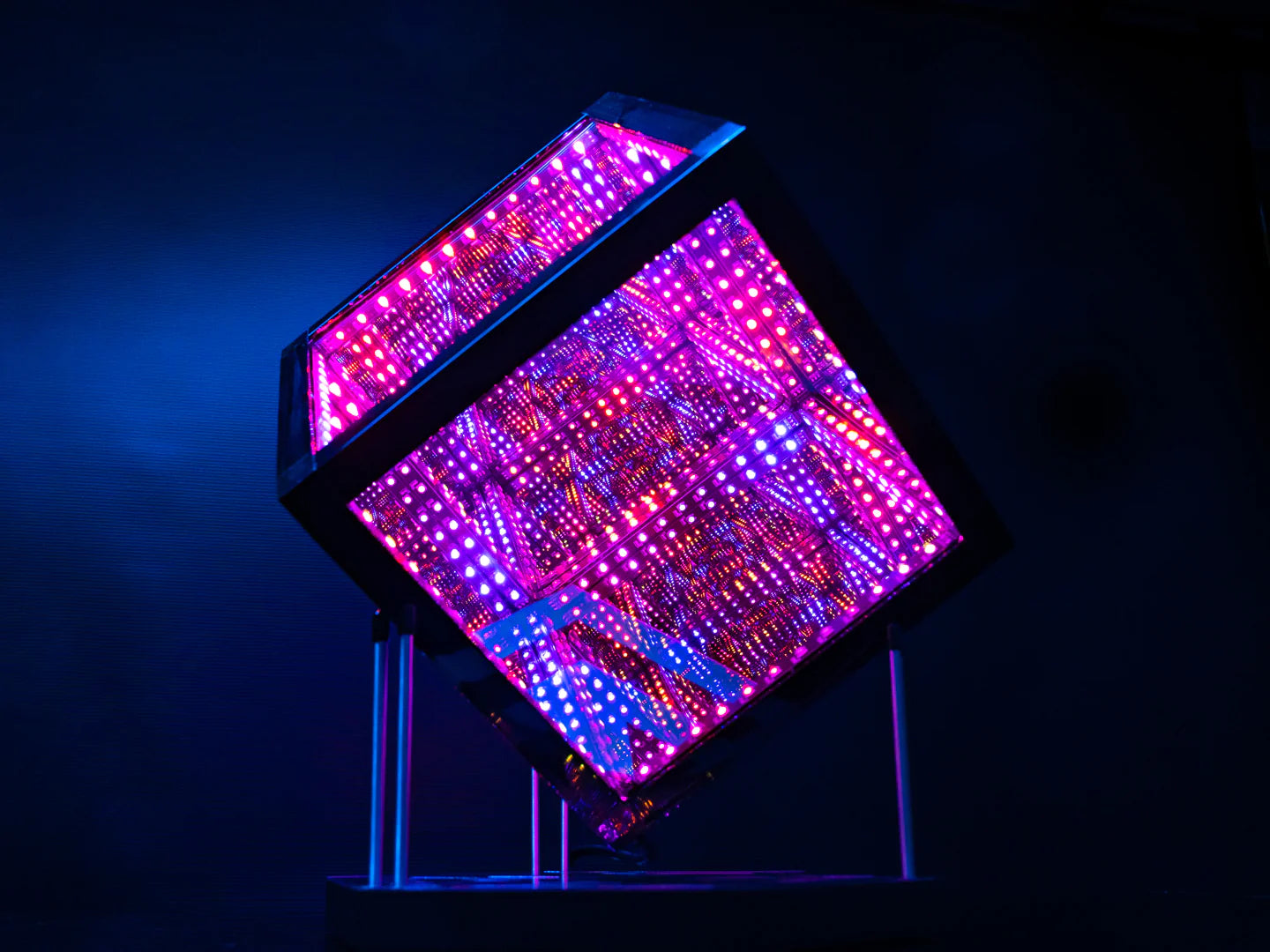 purple led cube on a stand