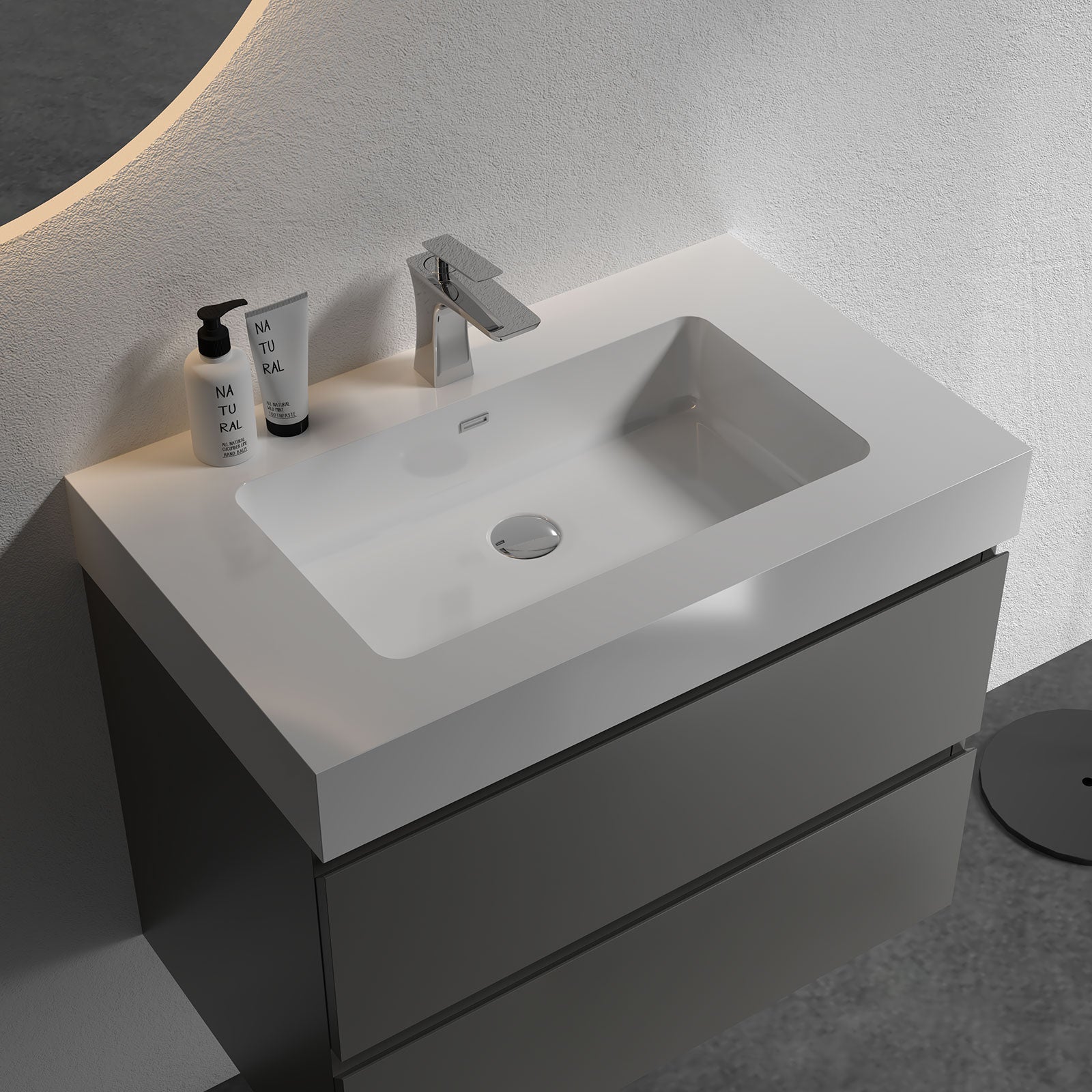 gray bathroom vanity with integrated basin