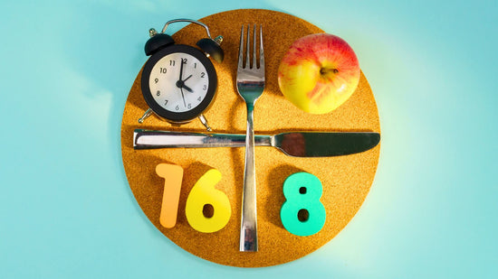  This image shows a plate with a clock set at approximately 10:09, a fork, a knife, and an apple. Additionally, there are colorful numbers 