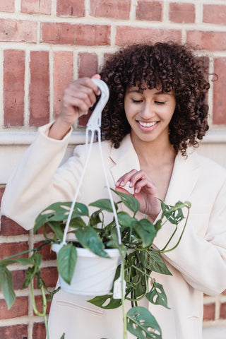 hanging plant with woman