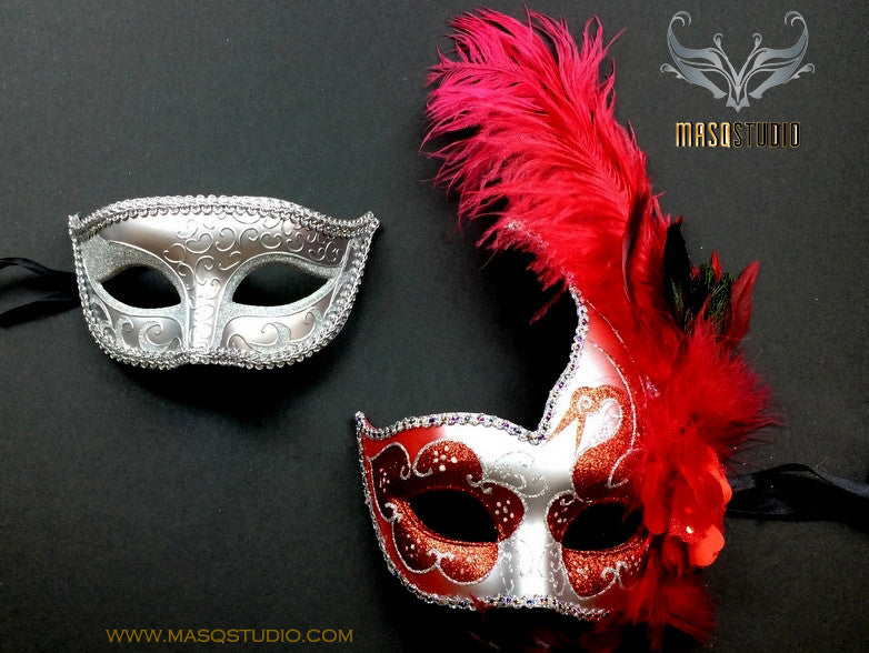 black and red masquerade mask with feathers