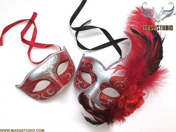 black and red masquerade mask with feathers