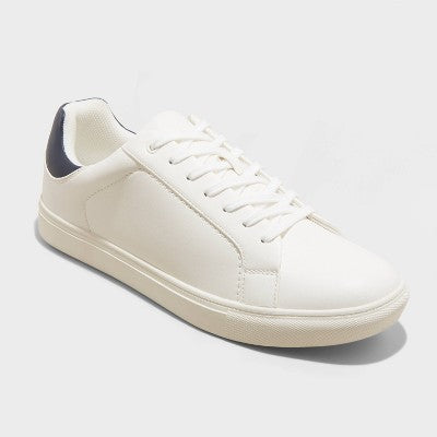 White sneaker with white laces and a black heel tab.