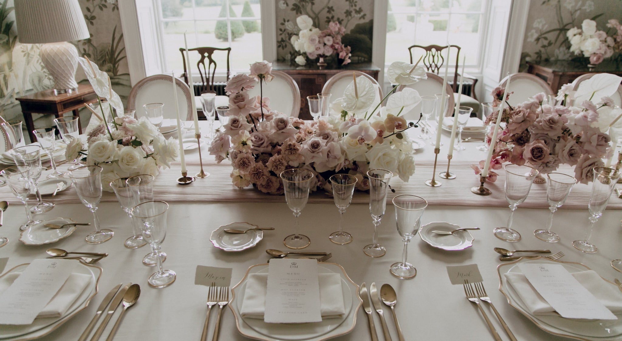 Using natural elements like flowers, foliage, and seashells to style the table