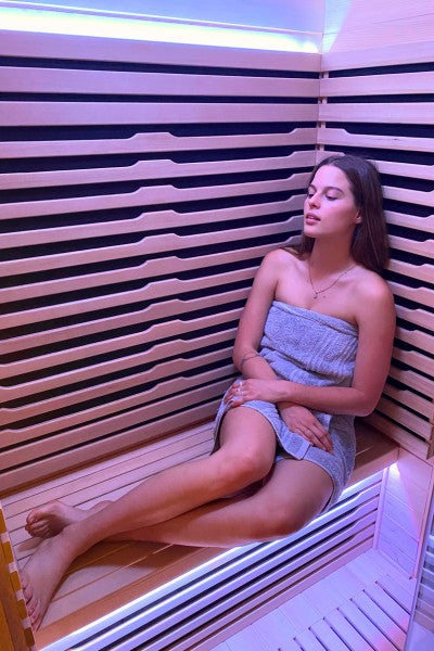 Australian woman relaxing in an Infrared Sauna