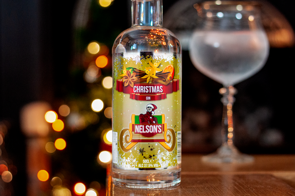 Nelson's Christmas Gin with Christmas background.
