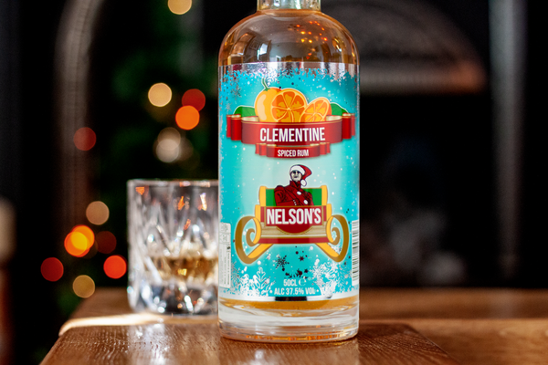Nelson's Clementine Spiced Rum with Christmas background.