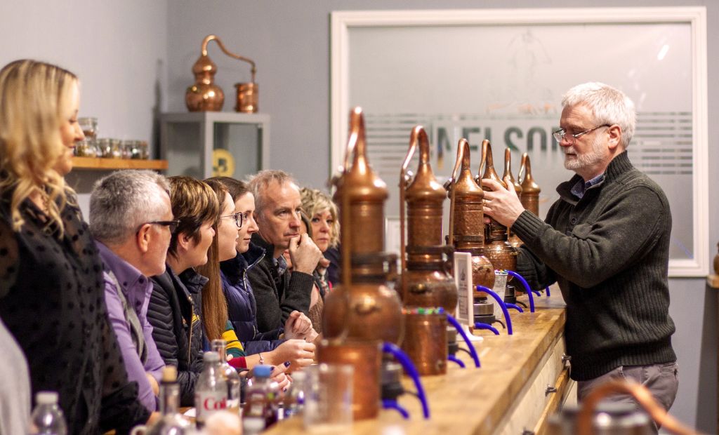 David Nelson's Gin, Vodka & Rum School Presenter helping students with their stills.