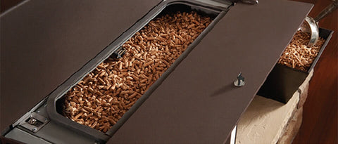 A hopper filled with pellets for a pellet stove