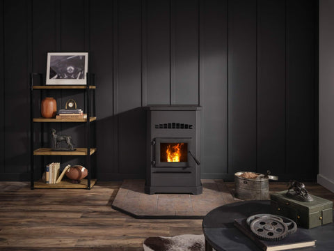 Pellet stove lit in a dark room