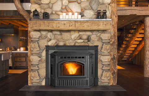 Matte black stove in a stone fireplace