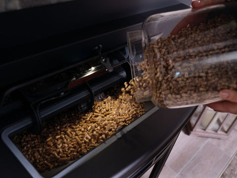 Filling a hopper with wood pellets