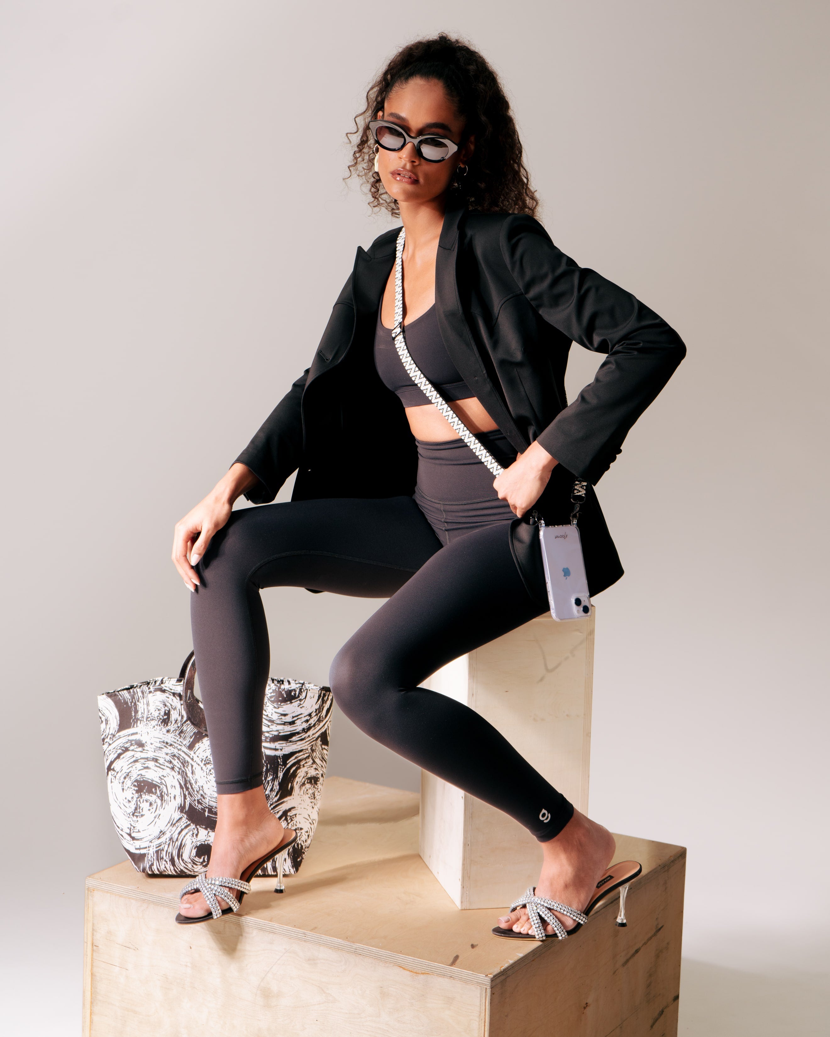 Models is wearing the  You Hung the Moon Blazer.