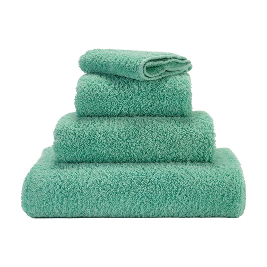 https://cdn.shopify.com/s/files/1/0664/9312/0730/products/luxury-super-pile-egyptian-cotton-towel-by-abyss-habidecore-214-opal-671637.jpg?v=1686864386&width=533