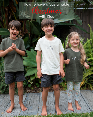 How to have a sustainable Christmas with kids. Photo of three kids in Arius clothing organic cotton t-shirts