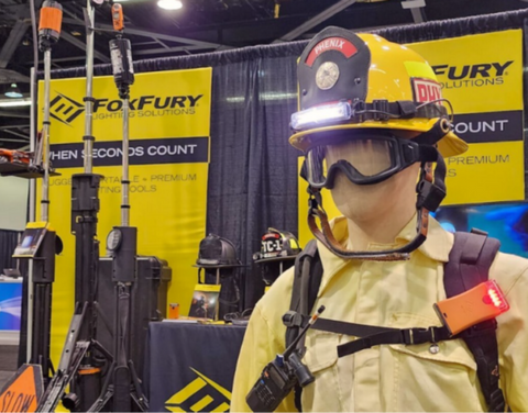 Phenix First Due Helmet at the FoxFury Booth with Helmet Light