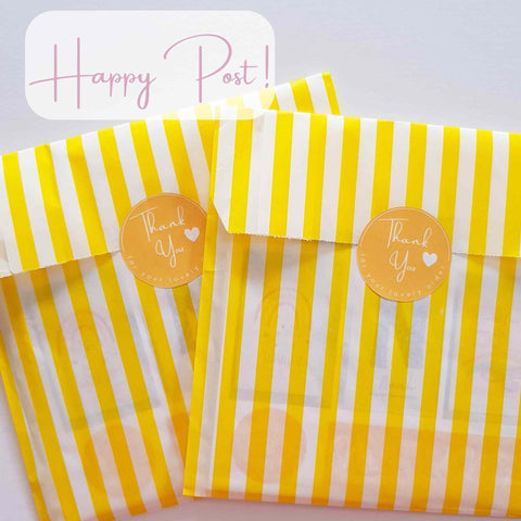 Yellow and White Packaging of Greeting cards