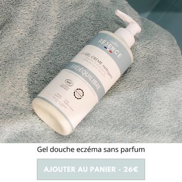 Gel douche eczéma Réjence posé sur une serviette bleue