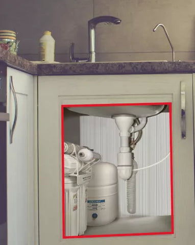 Reverse osmosis filter fitting into kitchen under the sink