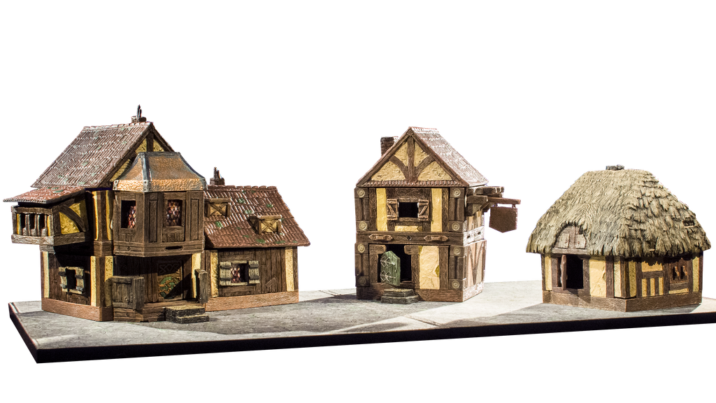 The Village Unbound of Time front view, three quaint Tudor and rustic wood buildings forming a small village