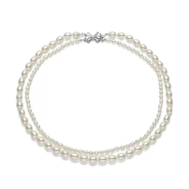 HOW MUCH IS A STRING OF PEARLS WORTH? – Angela Q
