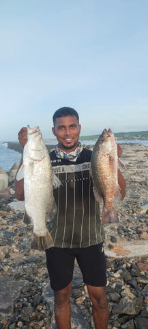 Angler Jerome Assir with Barra and Snapper