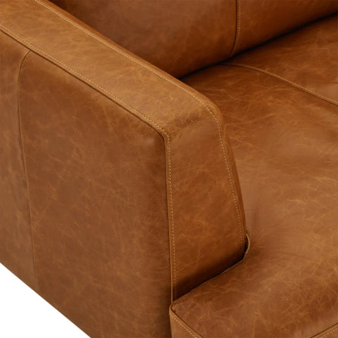 Texture rapprochée de cuir du fauteuil de la collection Havana par IBBE DESIGN