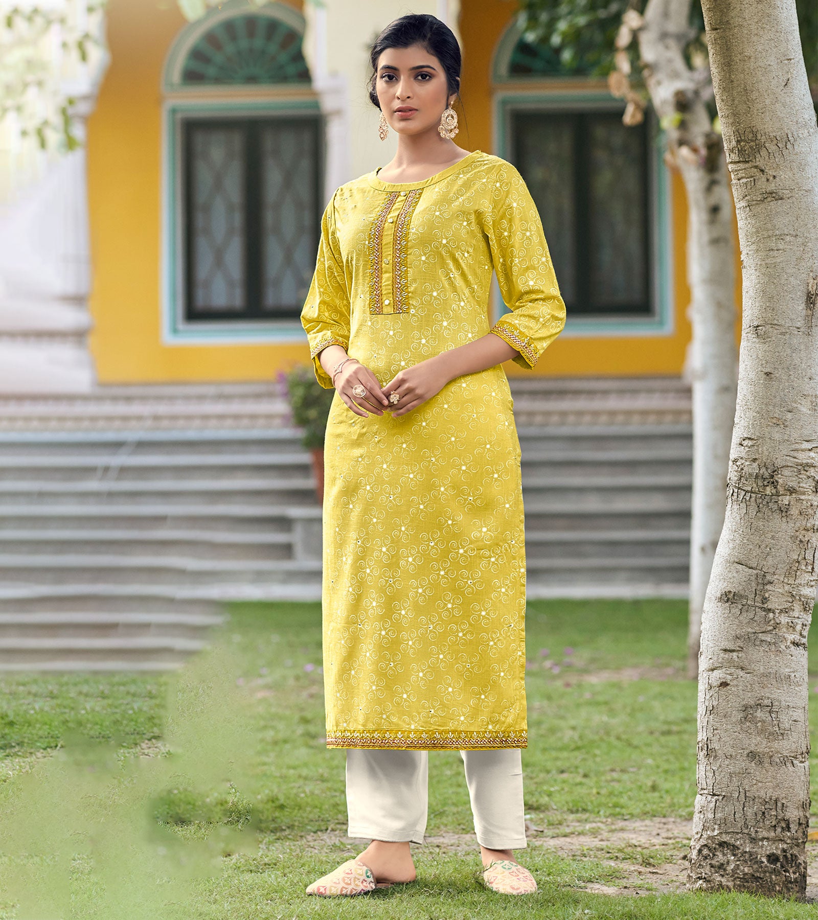 Lemon yellow kurti with thread embroidery work kirti