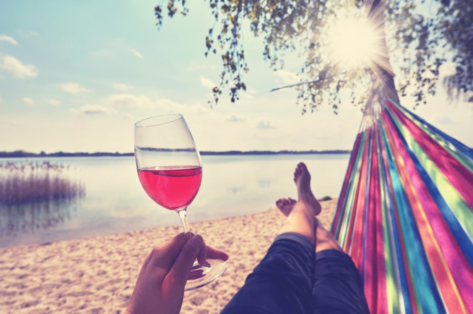 drinking wine in the beach