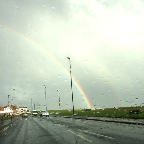 Rainbow over a rainy sky in Whitley Bay