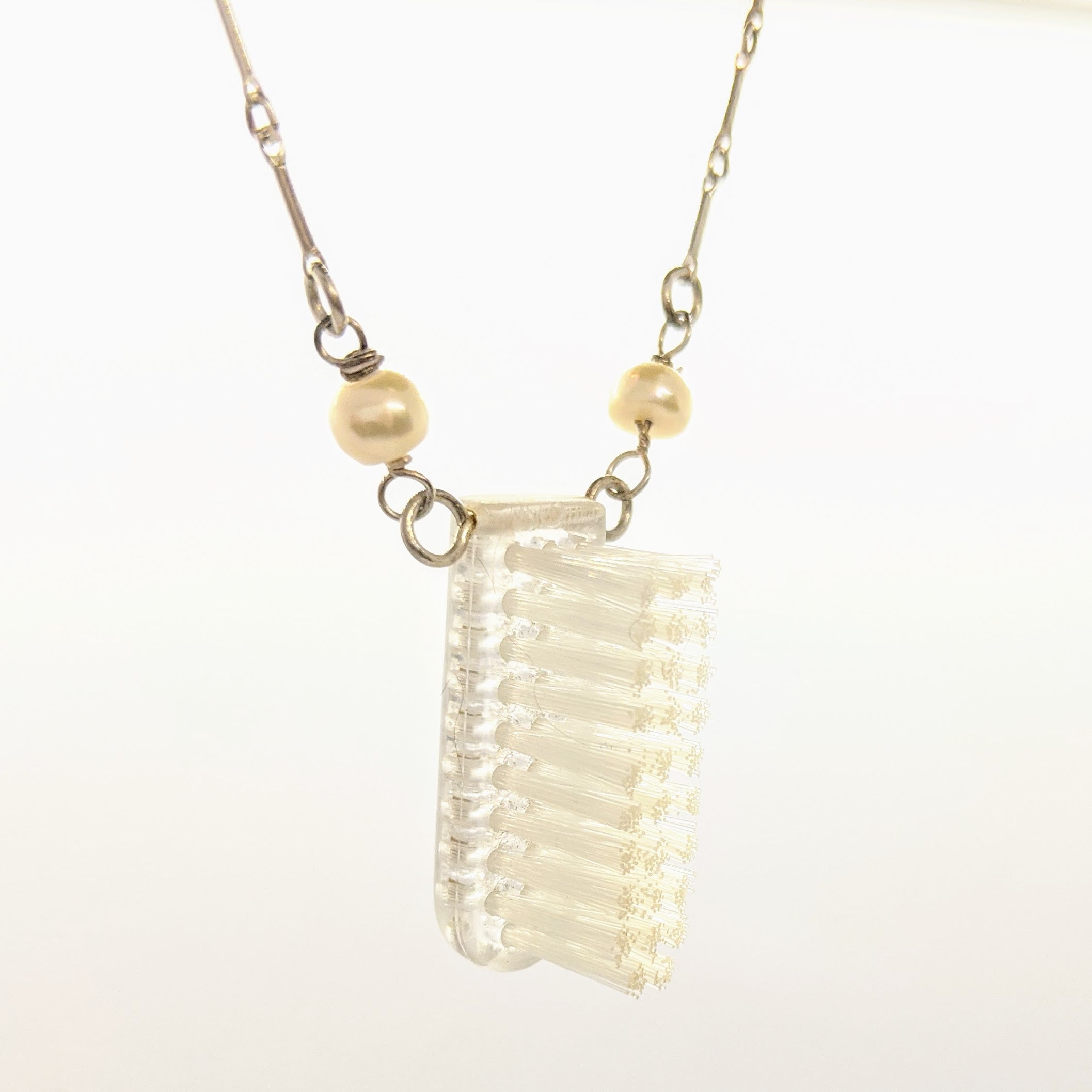 Clear toothbrush head necklace