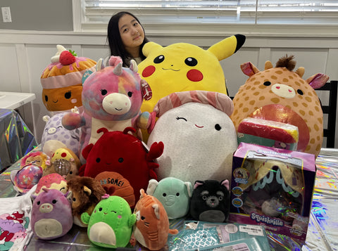 Natalie with some of her new Squishmallows she received on her birthday