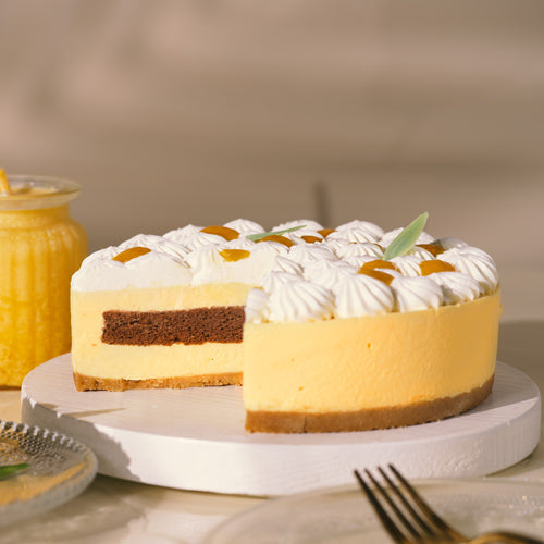 Cat-and-the-Fiddle-Delivery-2024-Mango-Passionfruit-Cheesecake-Lifestyle-500px.jpg__PID:01dfbca1-118f-46a6-bea0-e5cc980849ca