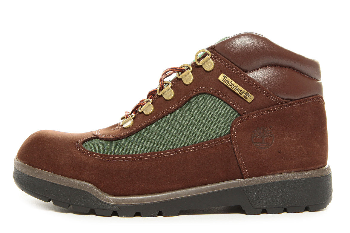 green and brown timberland field boots