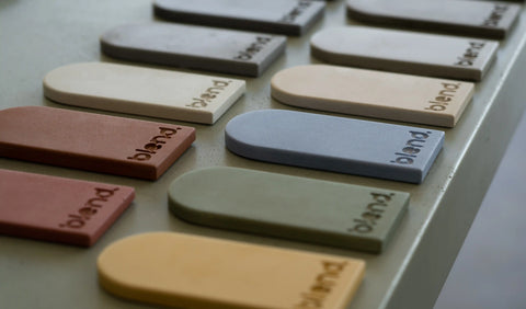 Blend Concrete Design Concrete Colour Samples on a Concrete Table showcasing 13 colour range