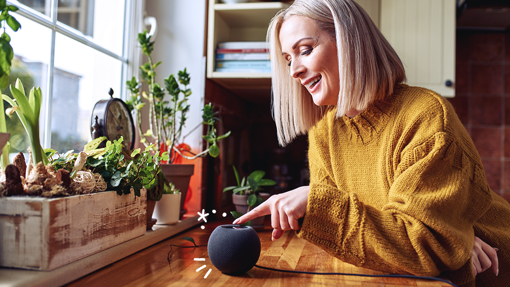 LADY WITH APPLE HOMEKIT HUB - Best smart home hub for apple products - grandgoldman.com