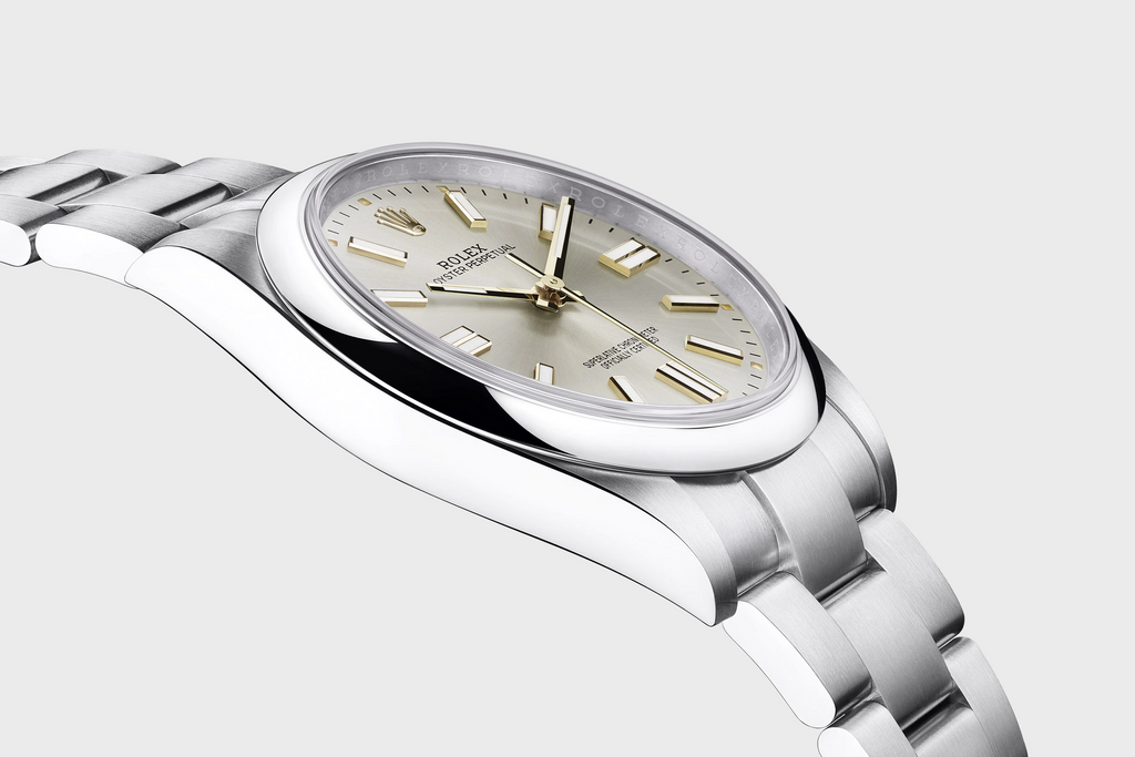 La Rolex Oyster Perpetual, grise avec cadran doré - Les meilleures montres Rolex dans lesquelles investir pour 2023 - PARADIS FISCAL - TAXHVN.COM