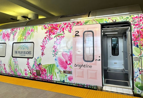 The Brightline train advertisement for Palm Beaches with artwork by Lydia Marie Elizabeth