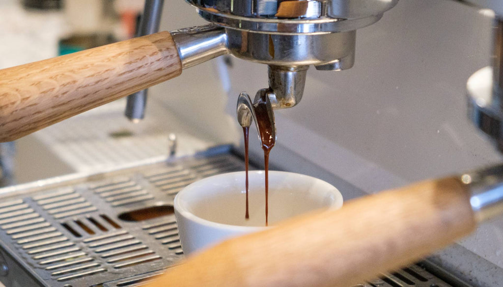 espresso pouring into cup
