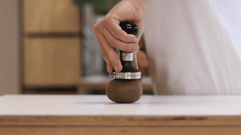 tamp pressure kiwifruit gif